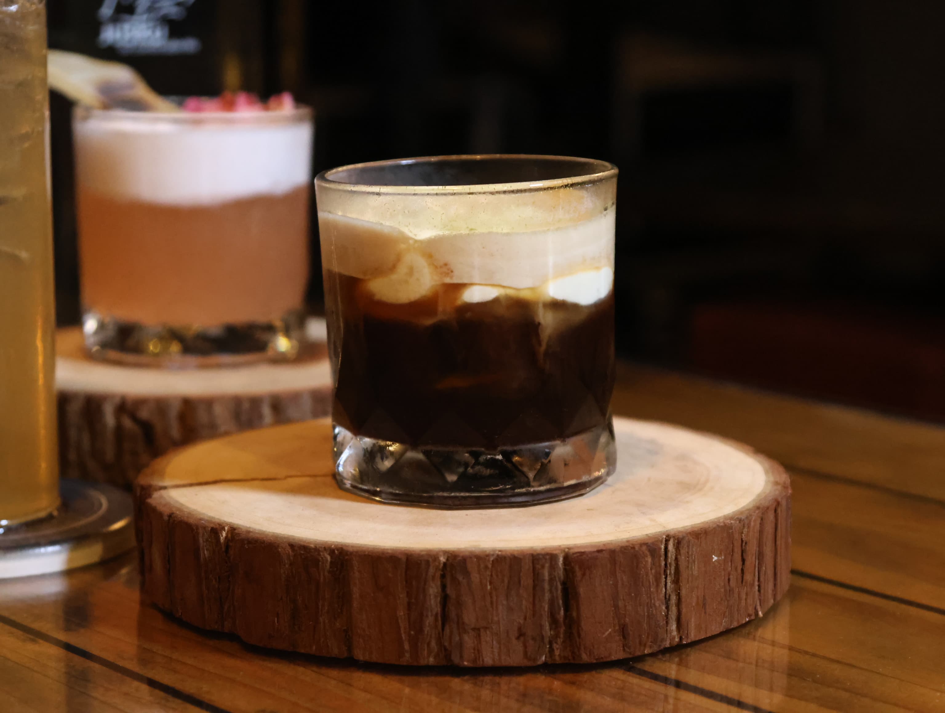 Whisky sour with rose & charred leaf